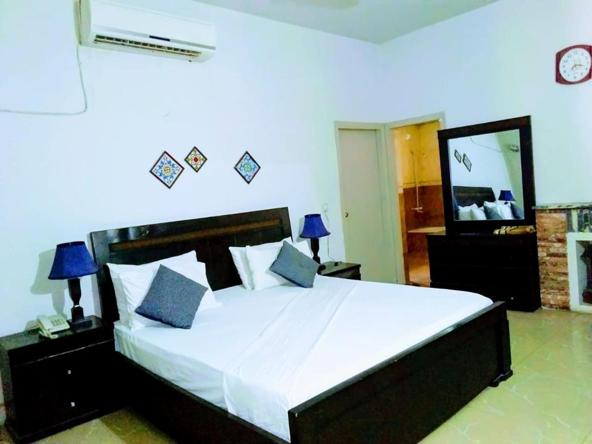 Pyramid International Guest House Islamabad Rom bilde